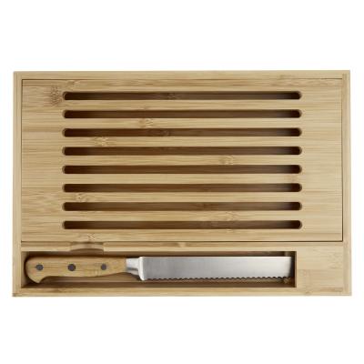 Image of Pao bamboo cutting board with knife